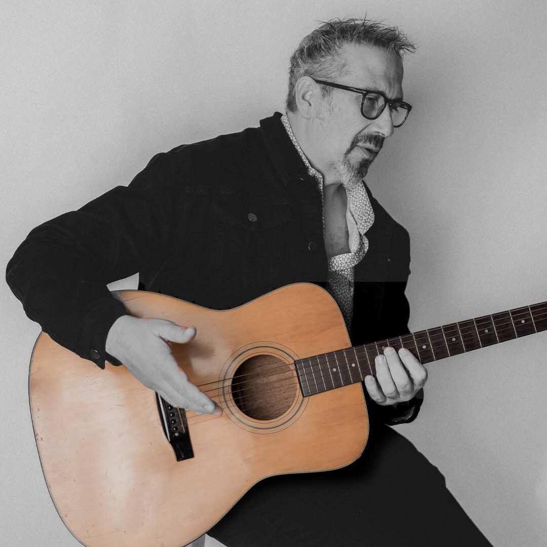 Greg Dunkailo Davis with guitar